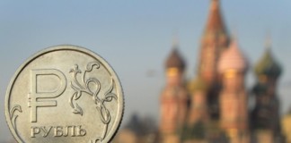Ruble drops to 2015 low amid oil price slump