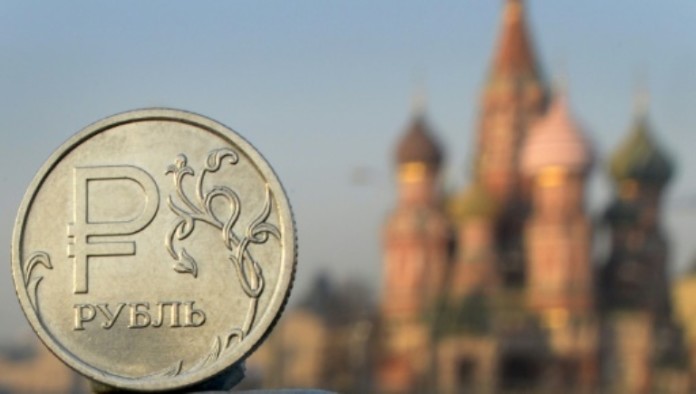 Ruble drops to 2015 low amid oil price slump